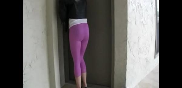  Blond girl pees her spandex leggings outside